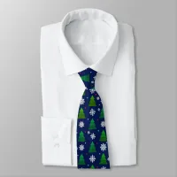 Christmas tree forest, snowflakes and red blue dot neck tie