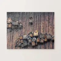 Birdhouses on a wooden wall, fun and tricky   jigsaw puzzle