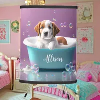 Cute puppy in a bathtub with soap bubbles tripod lamp