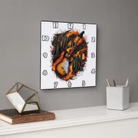 Rocking guitar amidst fiery flames at a concert square wall clock