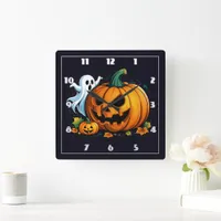 A playful ghost and carved pumpkin for Halloween Square Wall Clock