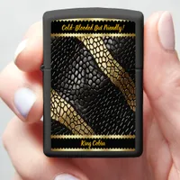 Elegant patterns of a black and gold snake skin zippo lighter