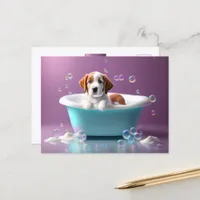 Cute puppy in a bathtub with soap bubbles postcard