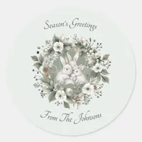 Cute Rabbits in a Floral Winter Wreath Classic Round Sticker