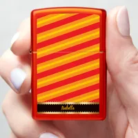 Bold red and yellow stripes create energy zippo lighter