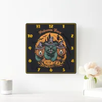 Halloween bears in playful witch hats at night square wall clock