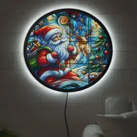 Santa delivers joy on a snowy night LED sign