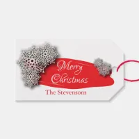 Christmas White Paper Cut Snowflakes On A Red Gift Tags