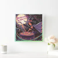 Witch brewing potions under a full moon square wall clock