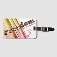 Freedom metallic multicolor effects written with c luggage tag