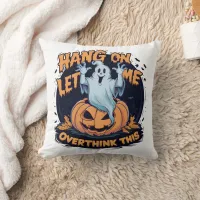 A playful ghost overthinking by a carved pumpkin throw pillow