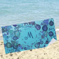 Modern geometric shapes with monogram in blue beach towel