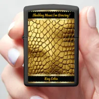 Golden snake skins gleam in the light zippo lighter