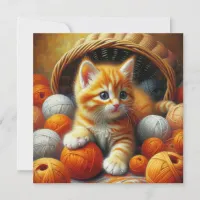 Cute Orange and White Kitten  Playing in Yarn