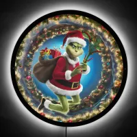 The Grinch sneaks gifts through a festive portal LED Sign