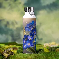 Forget-me-not flower with gold accents water bottle