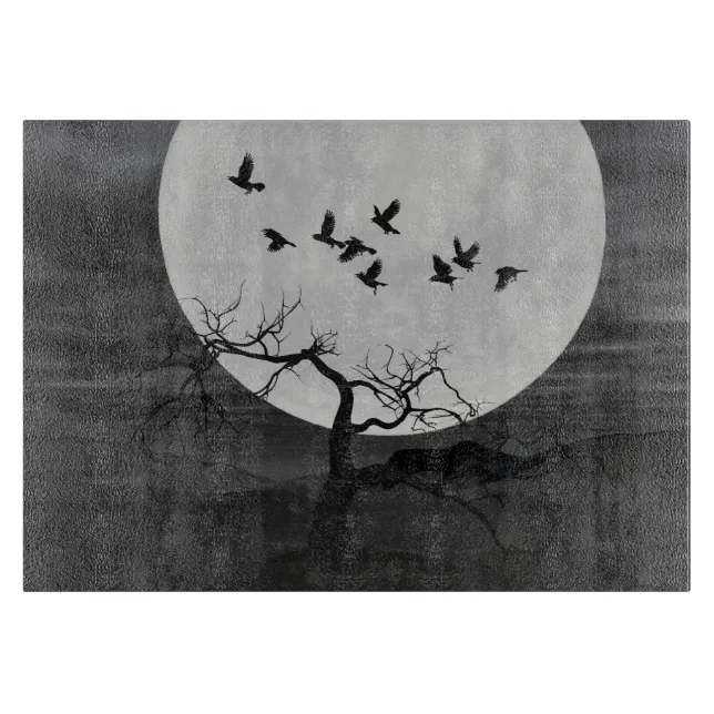 Spooky Ravens Flying Against the Full Moon Cutting Board