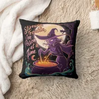 Witch brewing potions under a full moon throw pillow