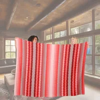 Modern striped design in various shades of red fleece blanket