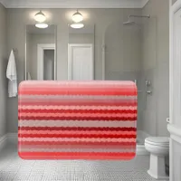 Modern striped design in various shades of red bath mat