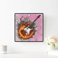 Guitar engulfed in vibrant flames and music notes square wall clock