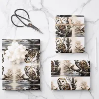 Cute owls sitting on a tree branch wrapping paper sheets