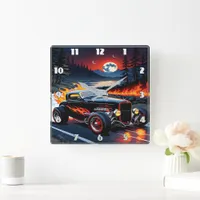 Classic hot rod cruising by a fiery river at dusk square wall clock