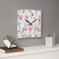 Giraffes grazing among colorful foliage in Africa Square Wall Clock