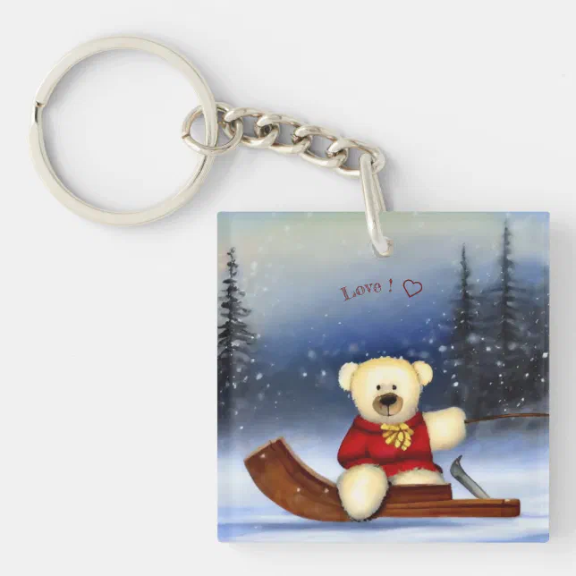 Bear on a sledge in the snow keychain