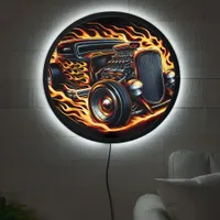 Hotrod racing through flames at sunset LED sign