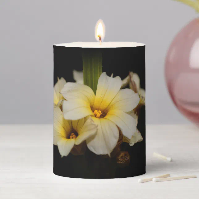 Beautiful Satin Flowers on Black Pillar Candle