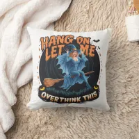 Witch flying over a spooky pumpkin patch at dusk throw pillow