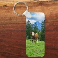 Cute cow in the pasture, photography  keychain