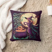 A witch brews potions under a full moon at night throw pillow