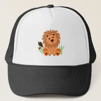 Cute lion in the grass with ladybug  trucker hat