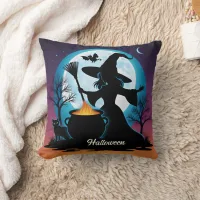 A witch brews up magic under a full moon throw pillow