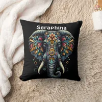 Colorful elephant adorned with intricate patterns throw pillow