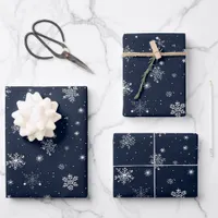 White Snowflakes on a Dark Blue Background Wrapping Paper Sheets