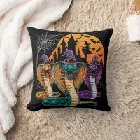 Halloween snakes in vibrant costumes at night throw pillow