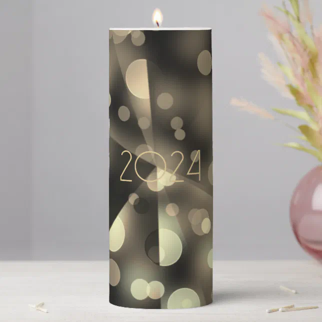 2024 new year with golden bubbles pillar candle