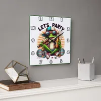 Frog in a cap enjoying a party on a skateboard square wall clock