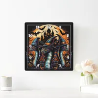 Halloween snakes in spooky setting at dusk square wall clock