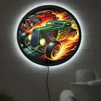 Classic hotrods racing through a fiery backdrop LED sign