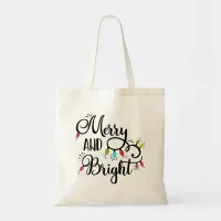 merry and bright holiday lights tote bag