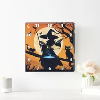 A witch brewing potions under a full moon square wall clock