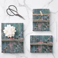 Rustic wooden gate and iron in blue wrapping paper sheets