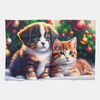 Cute puppy and cat under Christmas tree Kitchen Towel