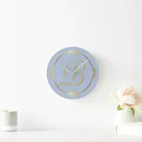 Monogram in gold with infinity circle on Blue | Round Clock