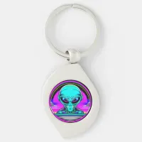 Extra Terrestrial Alien Flying a UFO Keychain