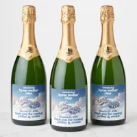 Cute Snow Leopard Cub Sleeps on Clouds Baby Shower Sparkling Wine Label
